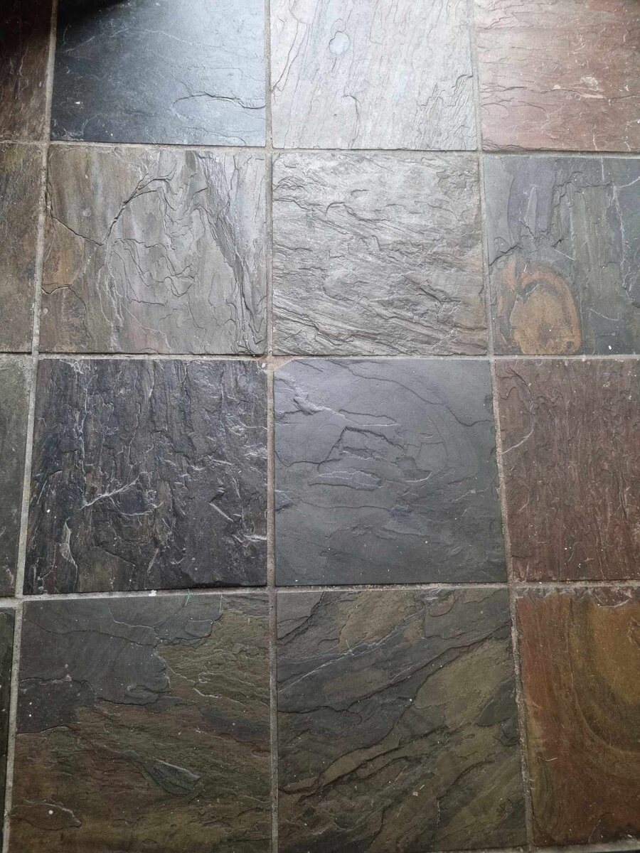Slate floor before cleaning